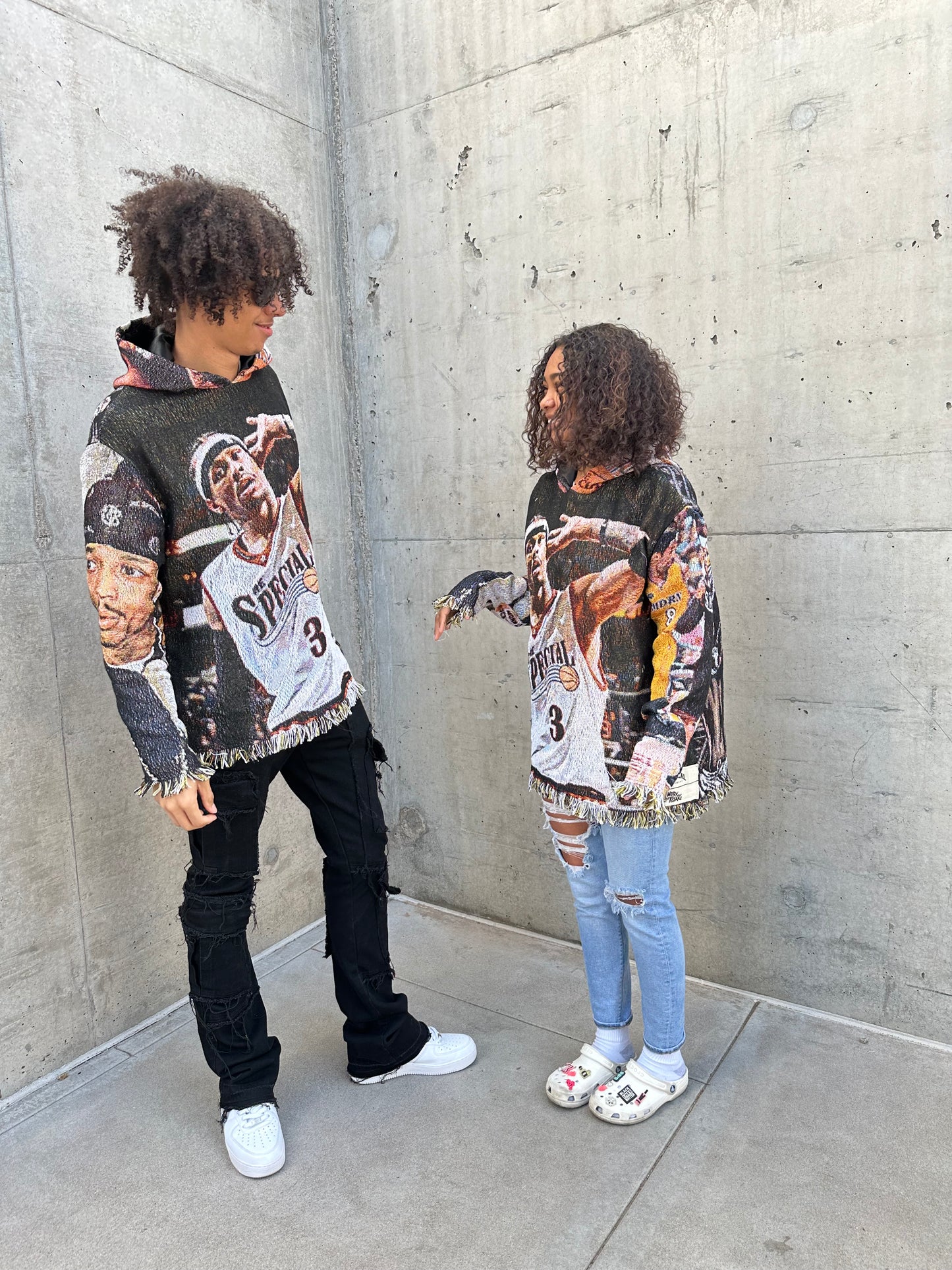 Boy and girl wearing our iverson hoodie